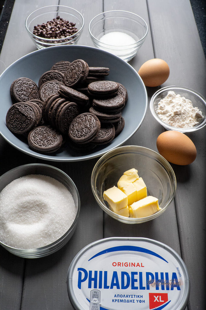 Ingredients for Oreo Chocolate Chip Cheesecake, Cream Cheese, Sugar, Butter, Flour, Chocolate Chip and two sleeves Oreo Cookies