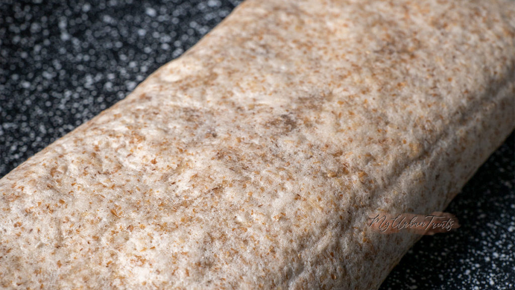 Burrito frying in a stone pan