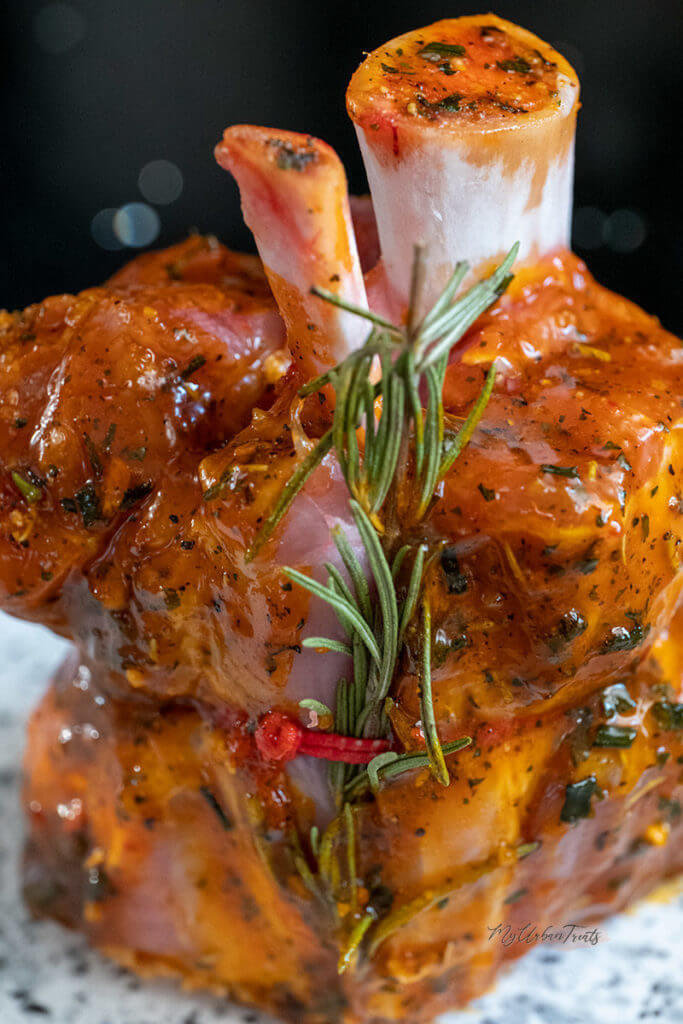 Tying a piece of rosemary to the pork shank will give it a subtle hint of its flavour